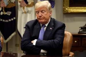 U.S. President Donald Trump listens during a roundtable discussion in the Roosevelt Room of the White House in Washington, D.C., U.S., on Thursday, Aug. 23, 2018.