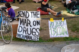 Placards calling for decriminalization of drugs are being displayed at a camp site during an pro-police abolition occupation of New York's City Hall.