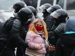 Riot police detain a protest in Minsk on Sunday