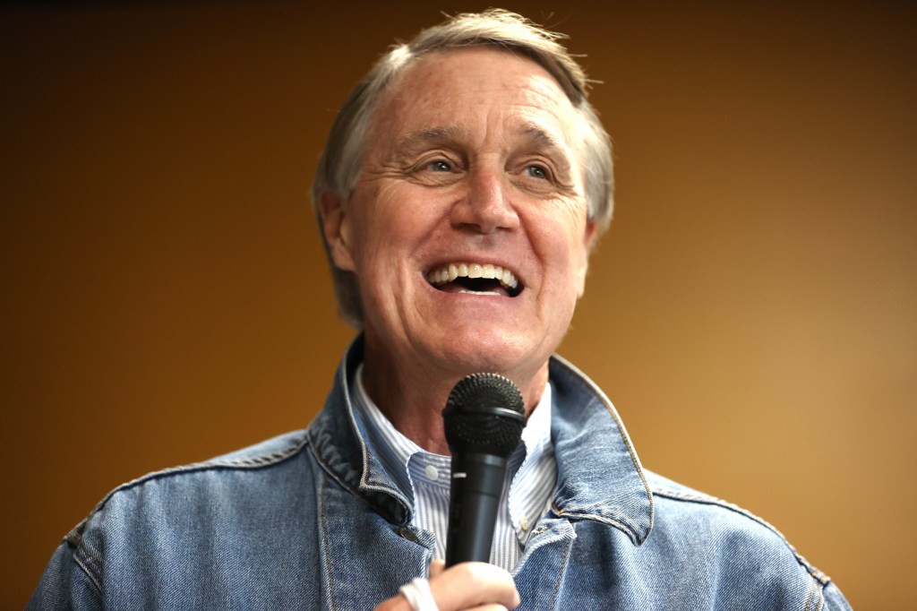 Republican senate candidate U.S. Sen. David Perdue (R-GA) speaks during a campaign event at Pot Luck Cafe on October 31, 2020 in Monroe, Georgia.  (Photo by Justin Sullivan/Getty Images)​