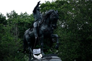 A sign hangs from the statue of George Washington in Union Square, New York, during a rally in June in response to the killing of George Floyd.