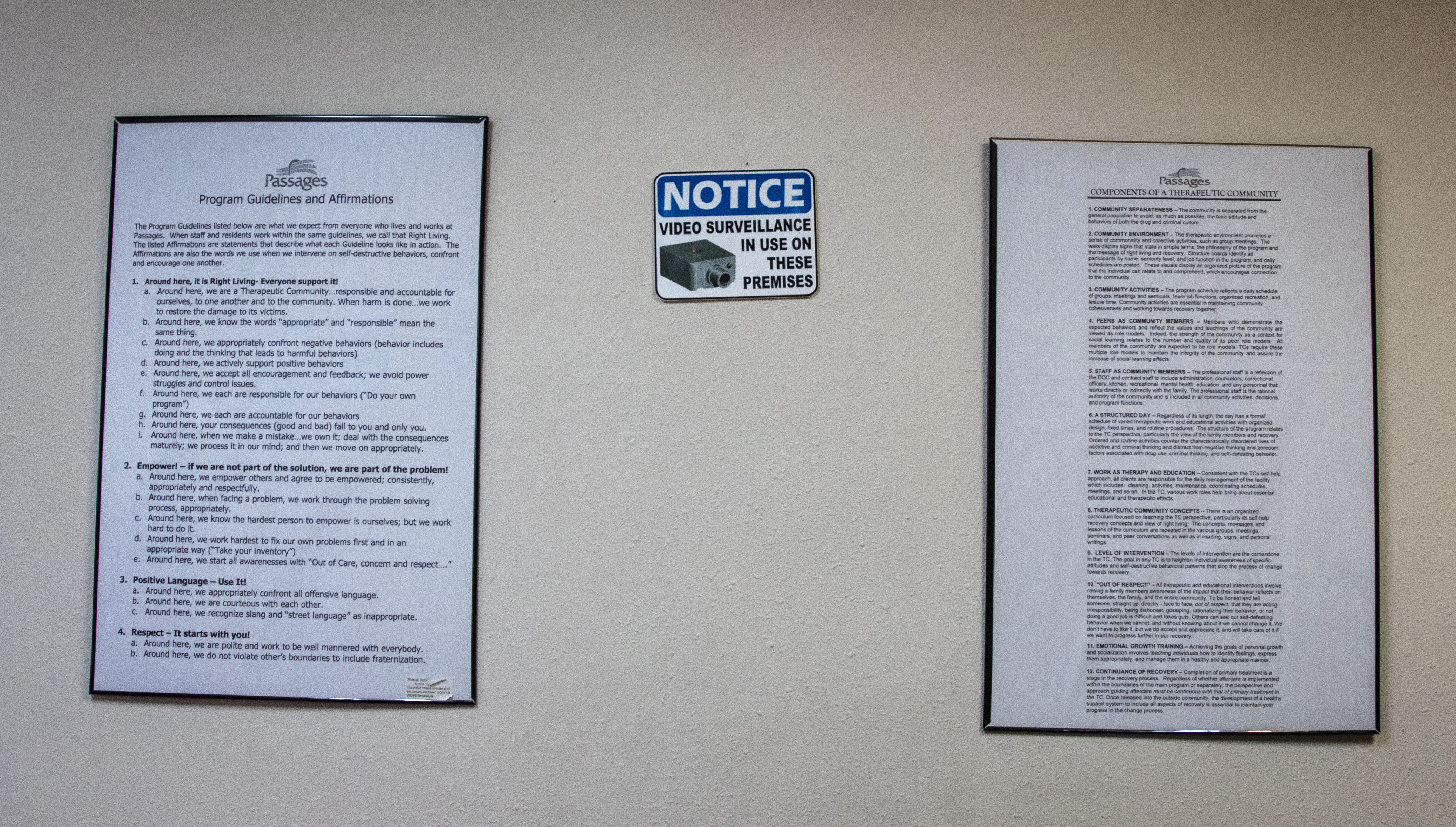 Long signs featuring Passages guidelines with a sign that reads 'video surveillance in use on these premises'