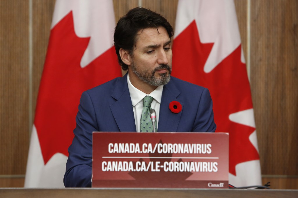 Justin Trudeau, Canada's prime minister, listens during a news conference in Ottawa, Ontario, Canada, on Friday, Nov. 6, 2020.