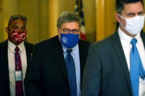 Attorney General William Barr leaves the office of Senate Majority Leader Mitch McConnell of Ky., on Capitol Hill in Washington, Monday, Nov. 9, 2020.