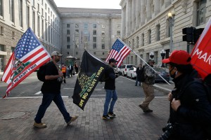 Proud Boys march with flags in Freedom Plaza during a demonstration in Washington, D.C., 12 December 2020 (Photo by John Lamparski / SOPA Images/Sipa USA)(Sipa via AP Images)​