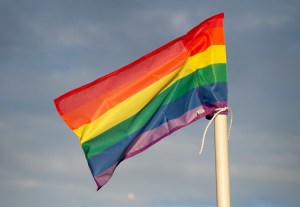 A rainbow corner flag supporting LGBT+ equality charity Stonewall in celebrating lesbian, bi, pan, ace, trans and non-binary identities​.