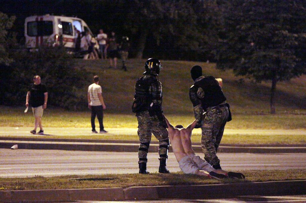 Riot police detain a protester in Minsk after polls closed in the presidential election in August. Photo: SIARHEI LESKIEC/AFP via Getty ImagesGettyImages-1227982462