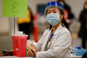 Pharmacist Khanh Pham is photographed at the Santa Clara County Fairgrounds in San Jose, California, United States on December 17, 2020.