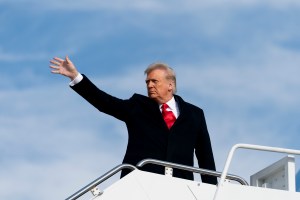 President Donald Trump boards Air Force One at in Andrews Air Force Base, Md., Saturday, Dec. 12, 2020, to travel to Michie Stadium at the United States Military Academy to attend the 121st Army-Navy Football Game at West Point, N.Y.