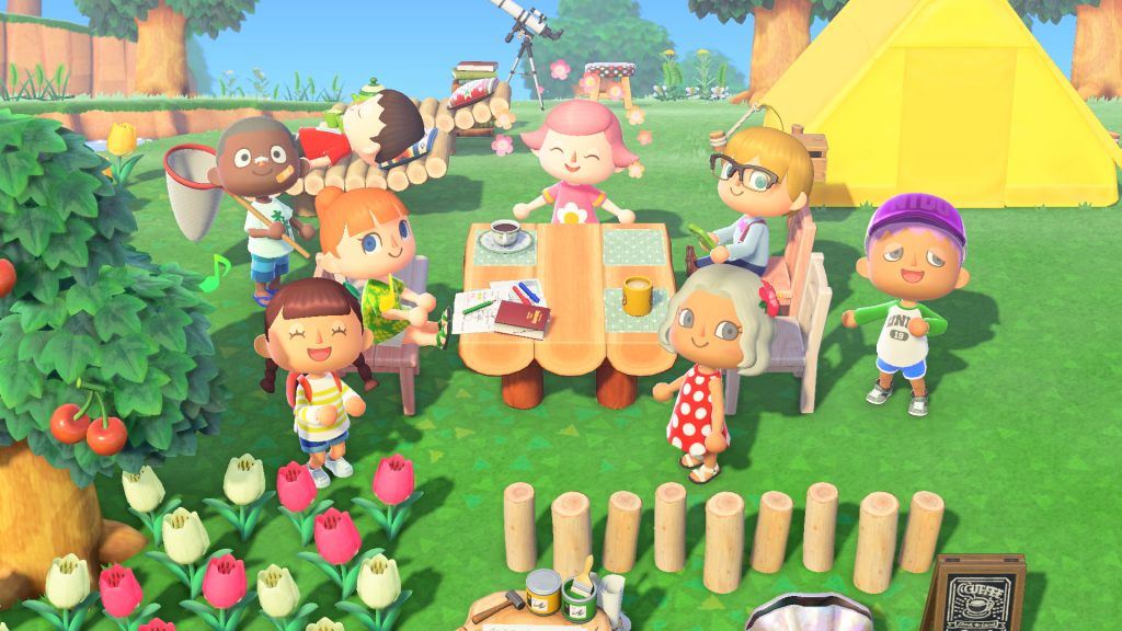 Screen Shot from Animal Crossing: New Horizons, A group of players surround an outdoor table made of logs.