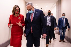 Speaker of the House Nancy Pelosi (D-CA) and Senate Minority Leader Chuck Schumer (D-NY) speak after a press conference on Capitol Hill on December 20, 2020 in Washington, DC.