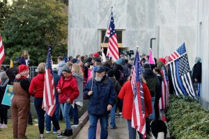 Pro-Trump and anti-mask demonstrators hold a rally outside the Oregon State Capitol on Monday, Dec. 21, 2020, as legislators meet for an emergency session.