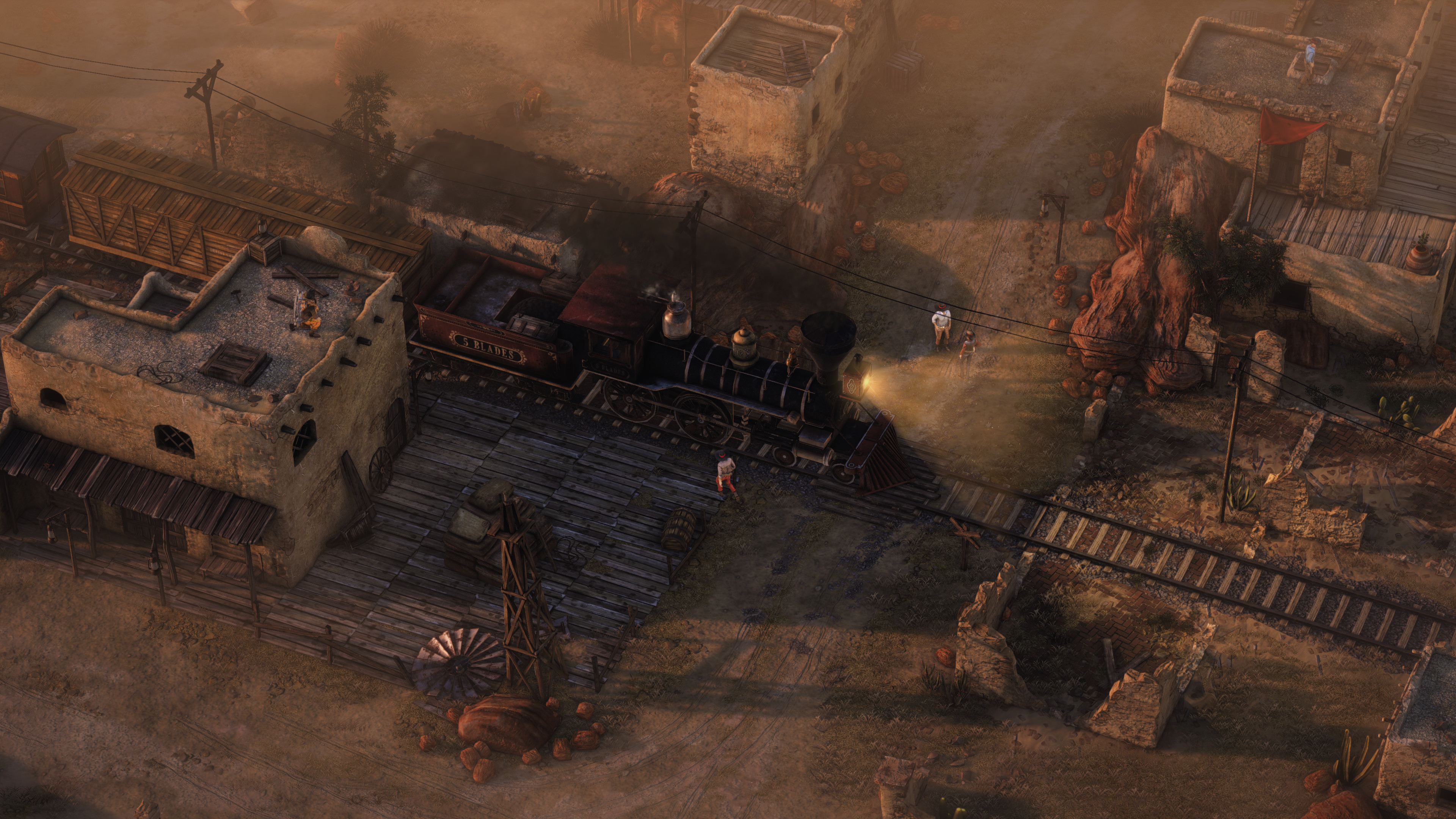 A train pulls into a frontier town in Desperados 3