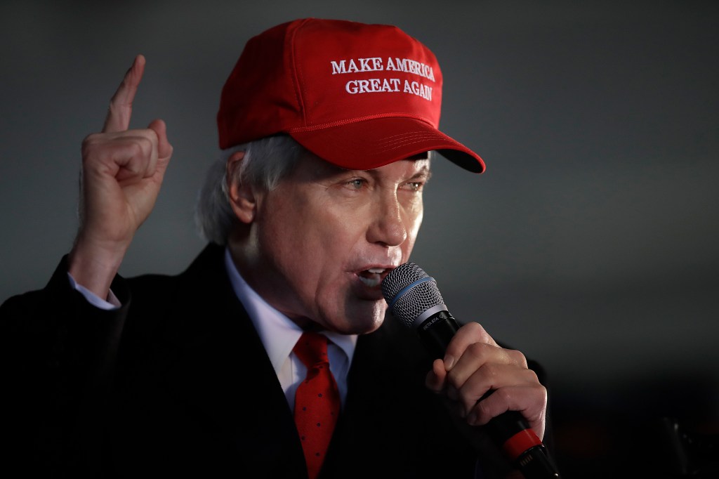 Attorney Lin Wood, member of President Donald Trump's legal team, gestures while speaking during a rally on Wednesday, Dec. 2, 2020, in Alpharetta, Ga.