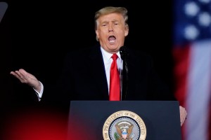 President Donald Trump speaks at a campaign rally in support of Senate candidates Sen. Kelly Loeffler, R-Ga., and David Perdue in Dalton, Ga., Monday, Jan. 4, 2021. (AP Photo/Brynn Anderson)