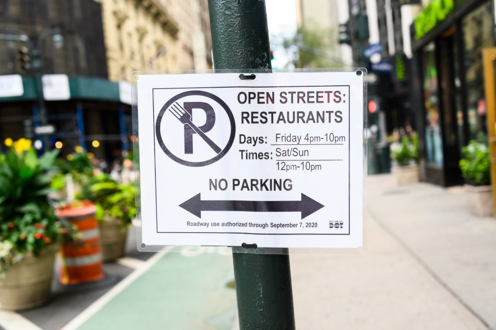 No parking open streets restaurants sign