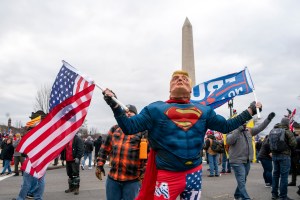 With the Washington Monument in the background, people attend a rally in support of President Donald Trump on Wednesday, Jan. 6, 2021, in Washington. (AP Photo/Jose Luis Magana)