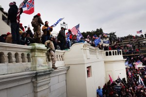 Thousands of Donald Trump supporters storm the United States Capitol building following a "Stop the Steal" rally on January 06, 2021 in Washington, DC. The protesters stormed the historic building, breaking windows and clashing with police.