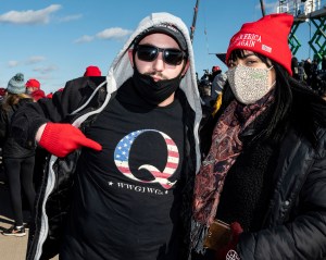 November 2, 2020 - Avoca, PA, United States: Man wearing a t-shirt with the QAnon symbol at a rally for President Donald Trump's reelection at Wilkes-Barre Scranton International Airport. (Photo by Michael Brochstein/Sipa USA)(Sipa via AP Images)