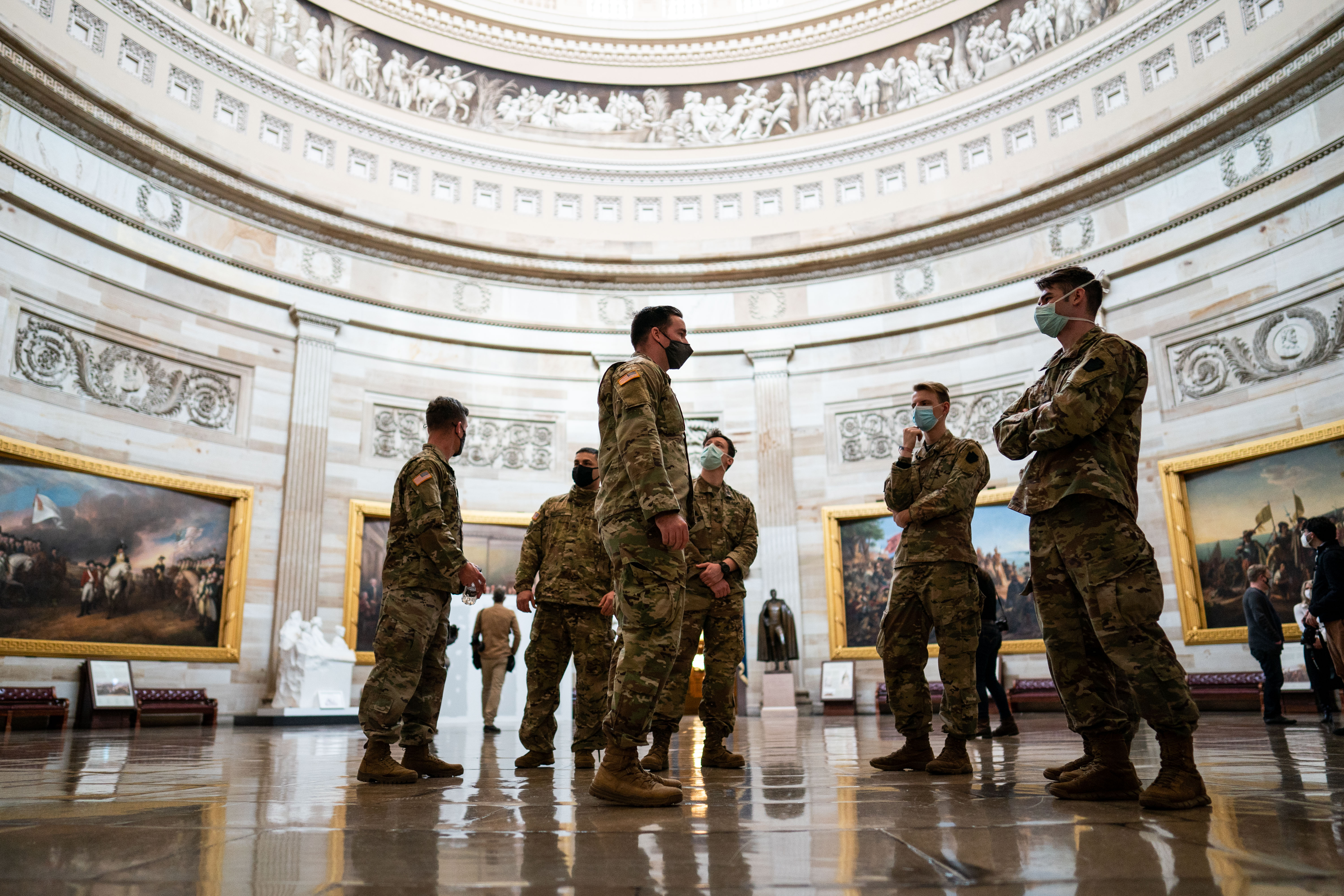 National Guard members stand in the rotunda.