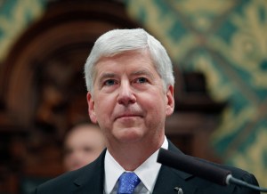 In this Jan. 23, 2018, file photo, former Michigan Gov. Rick Snyder delivers his State of the State address at the state Capitol in Lansing, Michigan.