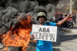 Haitians demonstrate on December 10, 2020, in Port-au-Prince, demanding their right to life in the face of an upsurge in kidnappings perpetrated by gangs