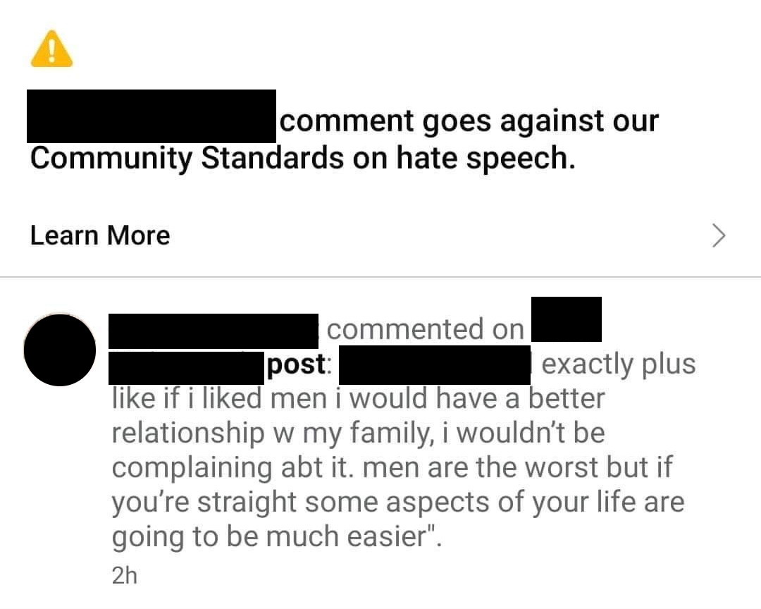 screenshot of a comment being removed for hate speech violation