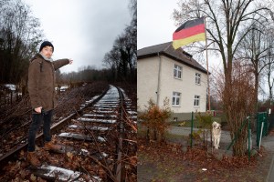 Der Autor weist sich selbst den Weg die Gleise entlang. Ein Hund unter einer Deutschlandflagge.