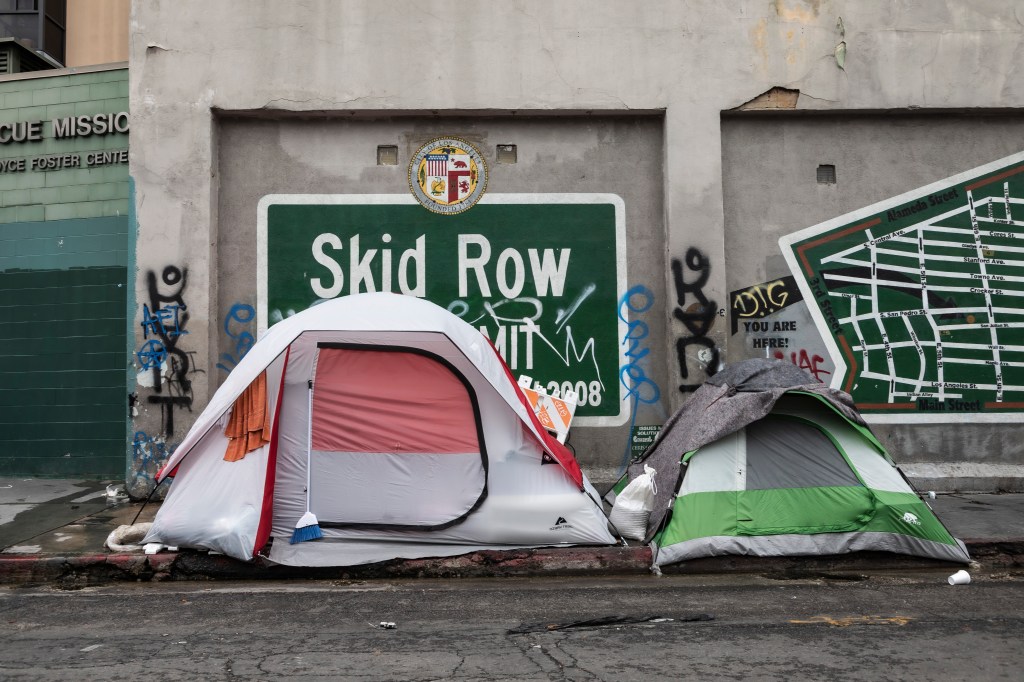 Skid Row in downtown Los Angeles has the city's largest population of homeless. The homeless remain the most vulnerable to contracting Covid-19 due to lack of sanitary facilities and overburdened city services.