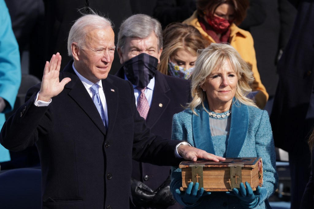 Joe Biden is sworn in as U.S. President during his inauguration on the West Front of the U.S. Capitol on January 20, 2021 in Washington, DC. During today's inauguration ceremony Joe Biden becomes the 46th president of the United States.