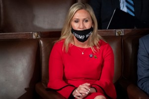 January 3: Rep.-elect Marjorie Taylor Greene, R-Ga., wears a "Trump Won" mask during the first session of the 117th Congress in the House Chamber as members of the 117th Congress are sworn in on Sunday, Jan. 3, 2021. (Photo by Caroline Brehman/CQ Roll Cal