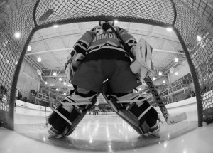 A goalie, seen from behind