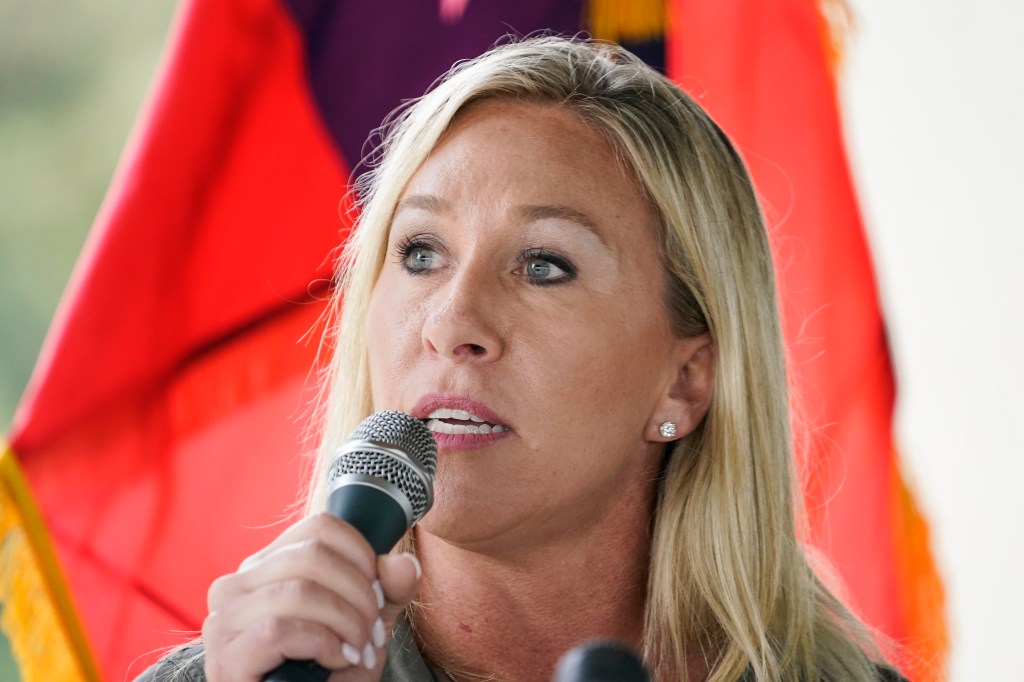 Marjorie Taylor Greene speaks during a news conference on Thursday, Oct. 15, 2020, in Dallas, Ga. (AP Photo/Brynn Anderson)