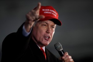 Attorney Lin Wood, member of President Donald Trump's legal team, speaks during a rally on Wednesday, Dec. 2, 2020, in Alpharetta, Ga.