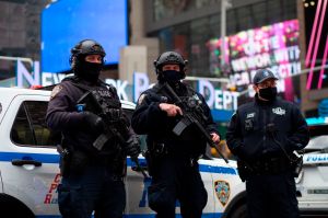 New York police officers patrol a street during the presidential inauguration on Jan. 20.