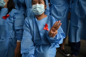 Myanmar; nurse; three-finger salute; protest