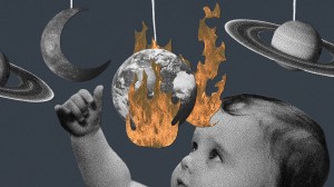 baby reaching up to a mobile that has a world on fire