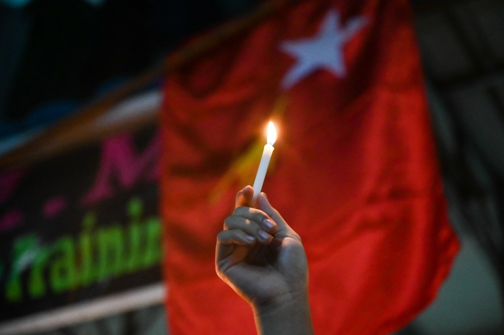 Protester; candle; Myanmar