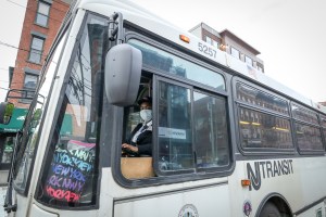 A New Jersey Transit bus driver wearing a mask