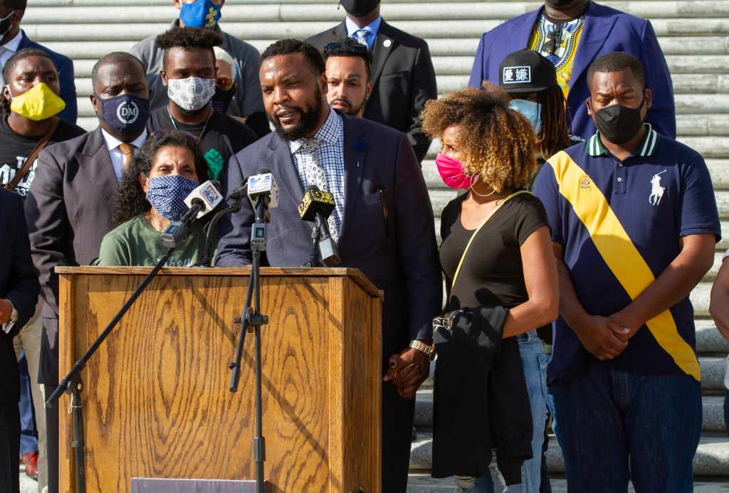 Attorney Lee Merritt speaks at a news conference along with the family of Ronald Greene and others outside the Louisiana State Capitol in Baton Rouge, La., Wednesday, Oct. 7, 2020.