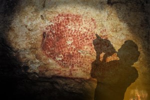 ​Concept art of a conch player in Marsoulas Cave. Image: G. Tosello