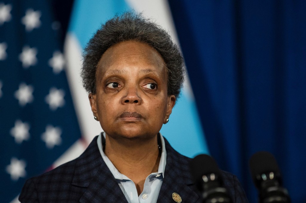 Chicago Mayor Lori Lightfoot listens to a question during a press conference at City Hall, Thursday morning, Feb. 4, 2021, in Chicago.