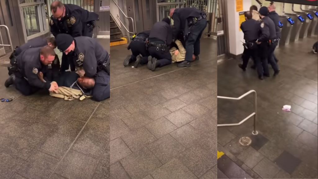 ​NYPD officers restrain Alex Lowery in a Lower Manhattan subway station on February 16, 2021.