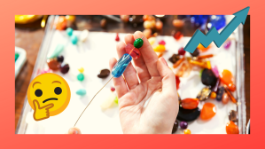 Female Model Makes Jewelry using Beads, Pliers and Other Tools at a Workbench