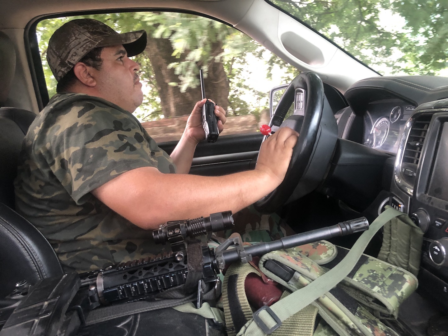 Rubén Baltazar, a militia commander known as El Chopo, on patrol in Aquila, Michoacán. Photo by Keegan Hamilton.