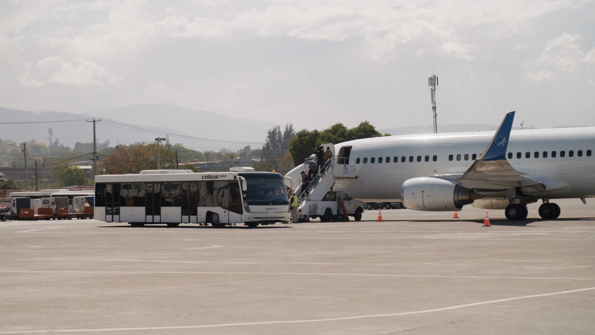 ​A flight filled with asylum-seekers lands in Port-au-Prince Haiti on Feb. 12, 2021. (Photo: Samuel Stonefield/VICE News)