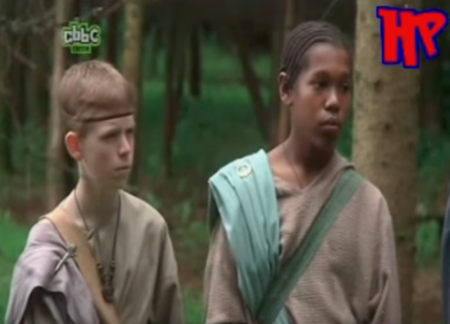 Lladel (right) takes part in medieval-themed challenge show 'Raven' as a 13-year-old. Screengrab via YouTube