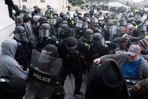 In this Jan. 6, 2021, file photo, U.S. Capitol Police push back rioters trying to enter the U.S. Capitol in Washington. (AP Photo/Jose Luis Magana, File)​