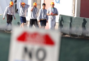 Migrant children separated from their families walk at a detention center in Homestead, Florida, on June 28, 2019