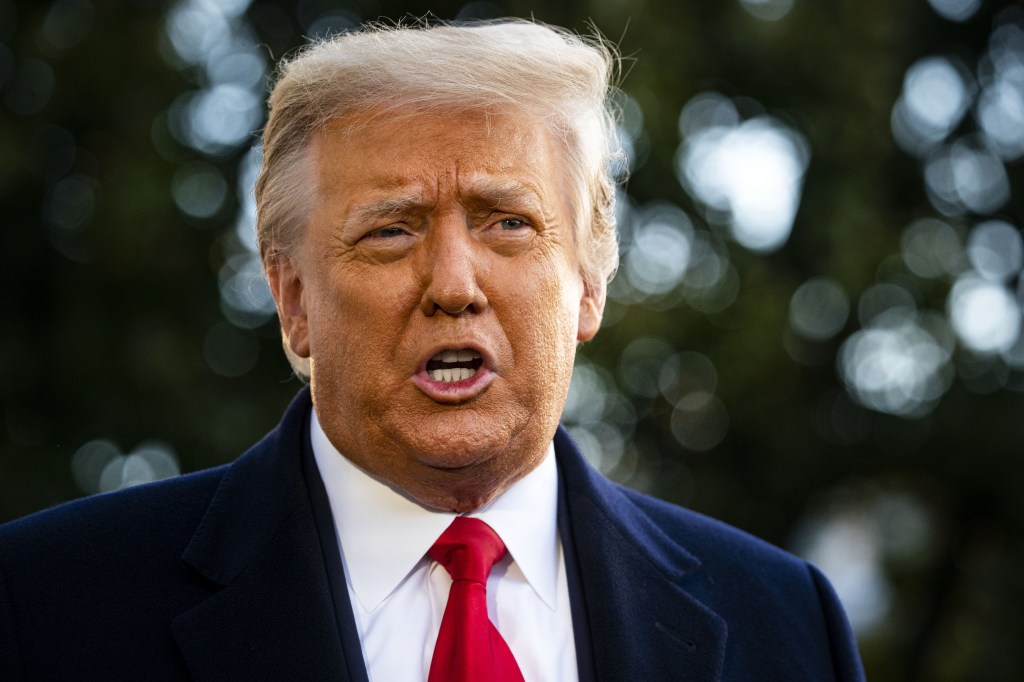 U.S. President Donald Trump speaks to members of the media before boarding Marine One on the South Lawn of the White House in Washington, D.C., U.S., on Wednesday, Jan. 20, 2021.